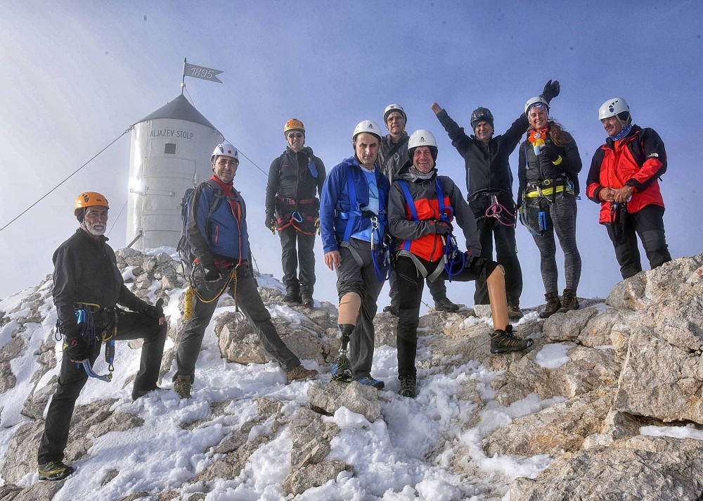 The team in front of Aljažev stolp at the top of Mt. Triglav (Photo: Žiga Živulović jr./BOBO)