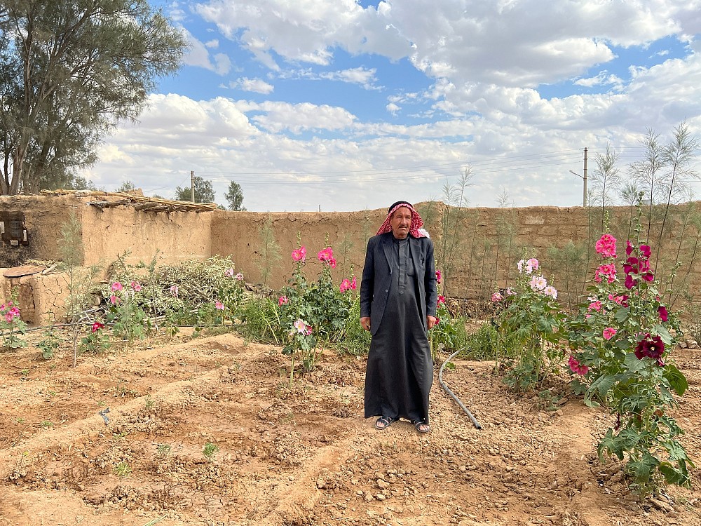 A project beneficiary in his garden.