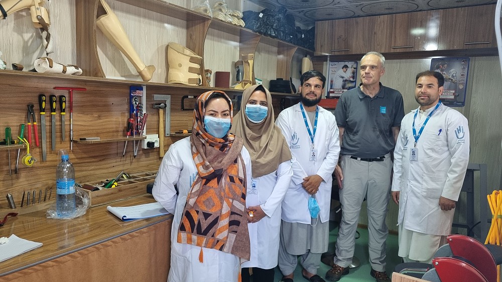 ITF representative with HI personnel in P&O Workshop.