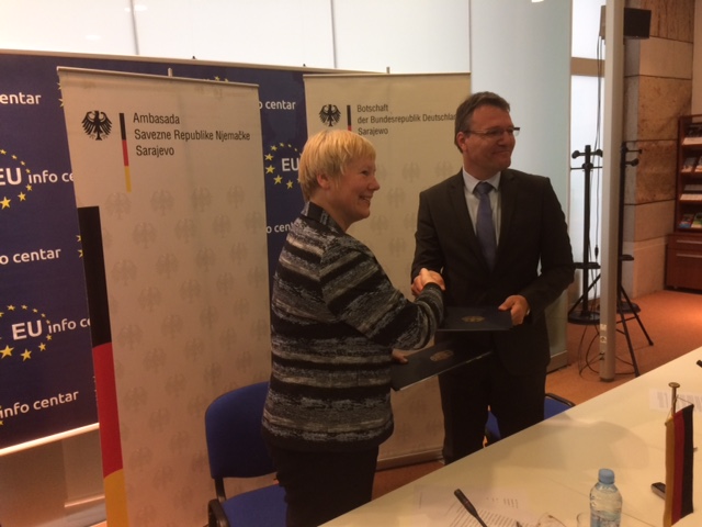 Handshake between Ambassador Christiane Hohmann and Ambassador Damjan Bergant